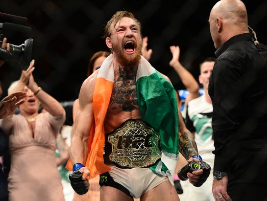 McGregor celebrates his second-round TKO of Chad Mendes