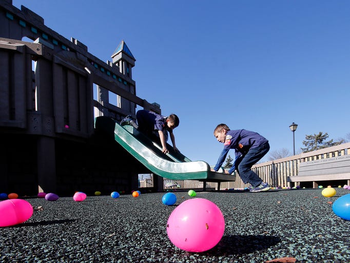 Cub Scouts Logan Hill, 8, (left) and Ryan Levy, 9,