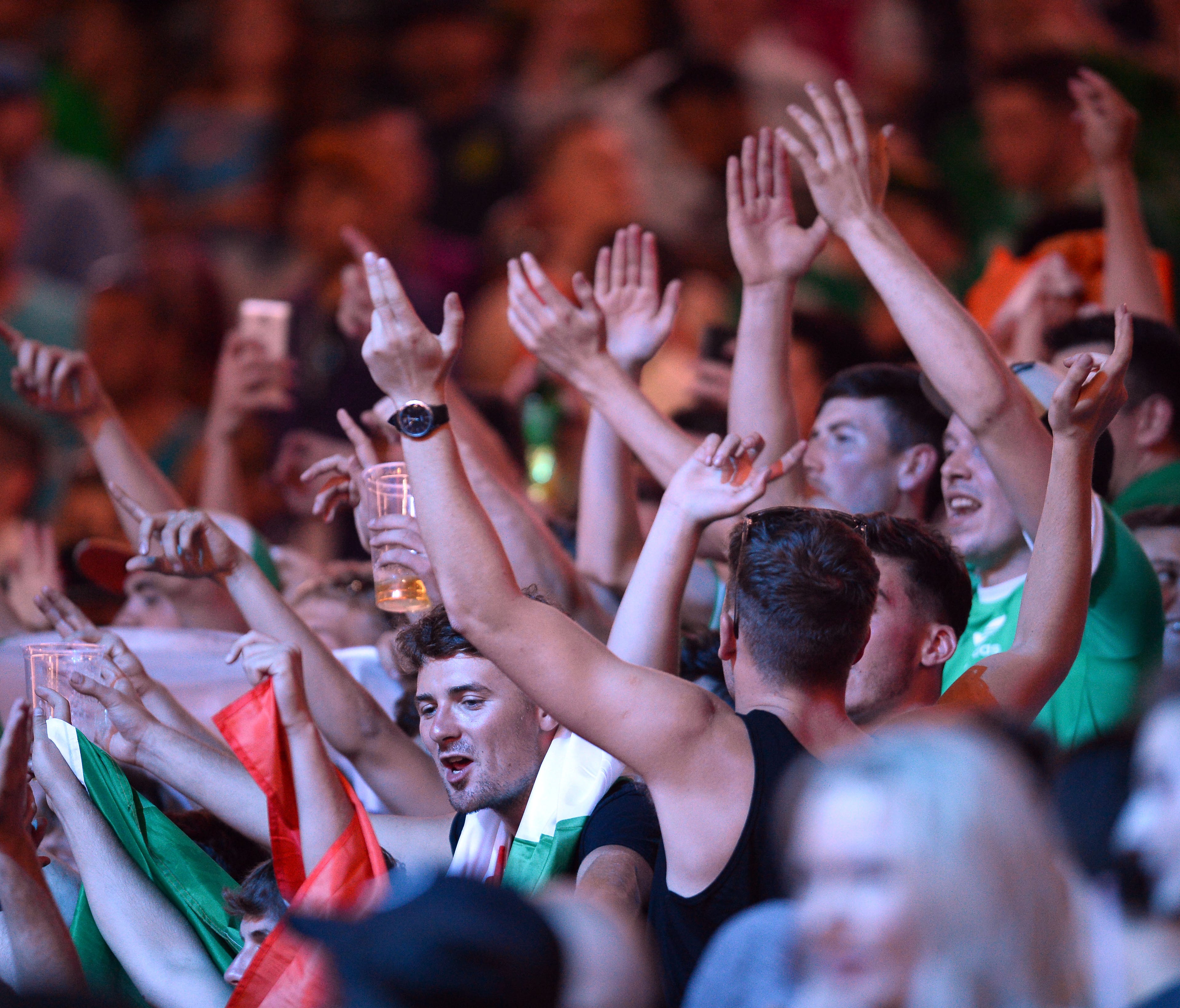 Fans cheer during weigh-ins for the upcoming boxing match between Floyd Mayweather Jr. and Conor McGregor.