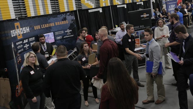 Oshkosh Corp. booth was a popular stop for prospective candidates looking for internships and jobs at the career fair.  UW-Oshkosh was host to Career Fair on the Fox where over 160 vendors attended the event to tell perspective employees about their company and interview students as they passed through Kolf Sports Center.