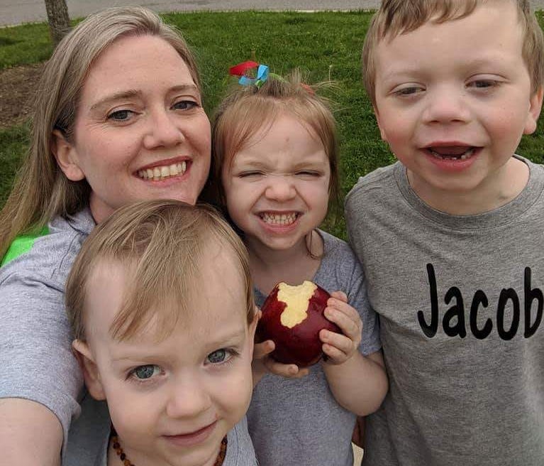 A photo posted to her Facebook page features Julie Edwards with her children Paxton, Brinley and Jacob.