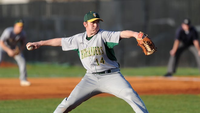 Floyd Central pitcher Chase Stepp (14) delivers a pitch to New Albany on Wednesday at Mount Tabor Baseball Park in New Albany. (Photo by David Lee Hartlage, Special to The Courier-Journal) April 12, 2017