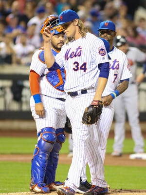 New York Mets pitcher Noah Syndergaard (34) is taken out in the  fourth inning against the Atlanta Braves at Citi Field on Monday, Sept. 19, 2016.