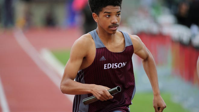 Edison's Samuel Williams runs the anchor leg of the the 4x 800 meter relay, won by the Inventors.