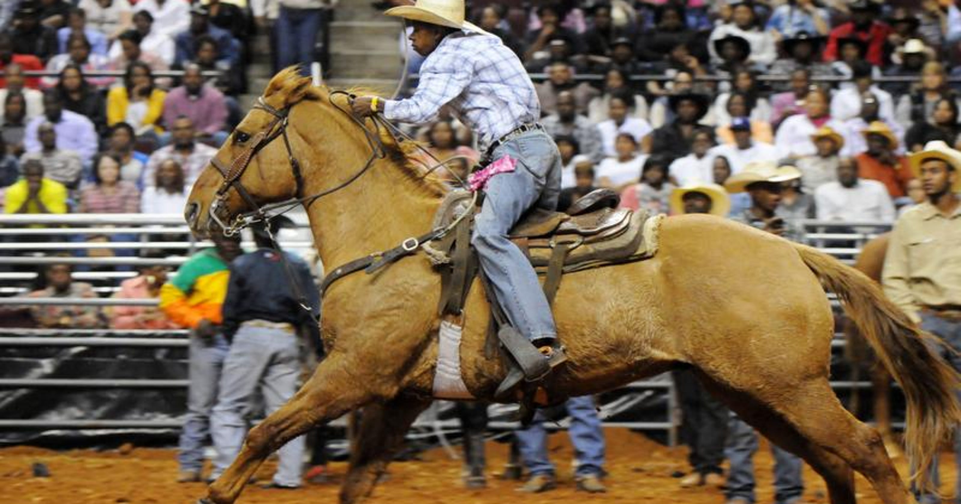 Cowboys ride for soldout crowd at National Black Rodeo Finals