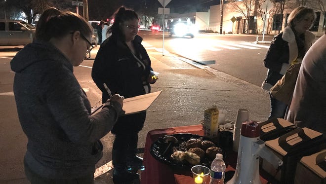 A group of about 25 nurses at Shasta Regional Medical Center and their supporters held a candlelight protest Thursday night outside the Redding hospital. Nurses say patient care is suffering at SRMC but a hospital official points to a number of national awards the health facility has received for quality and safety.