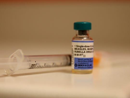 In this photo, a vial containing a measles vaccine is seen at the Miami Children's Hospital in Miami, Florida.