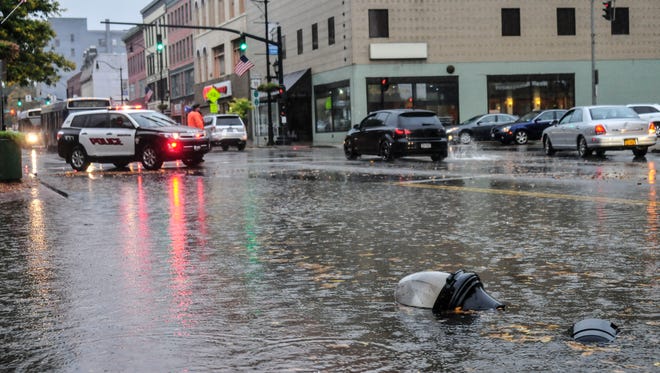 Binghamton police had to shut down parts of Court Street in October when heavy rains caused partial flooding. The Binghamton area has been particularly hard hit by extreme precipitation the past few years.