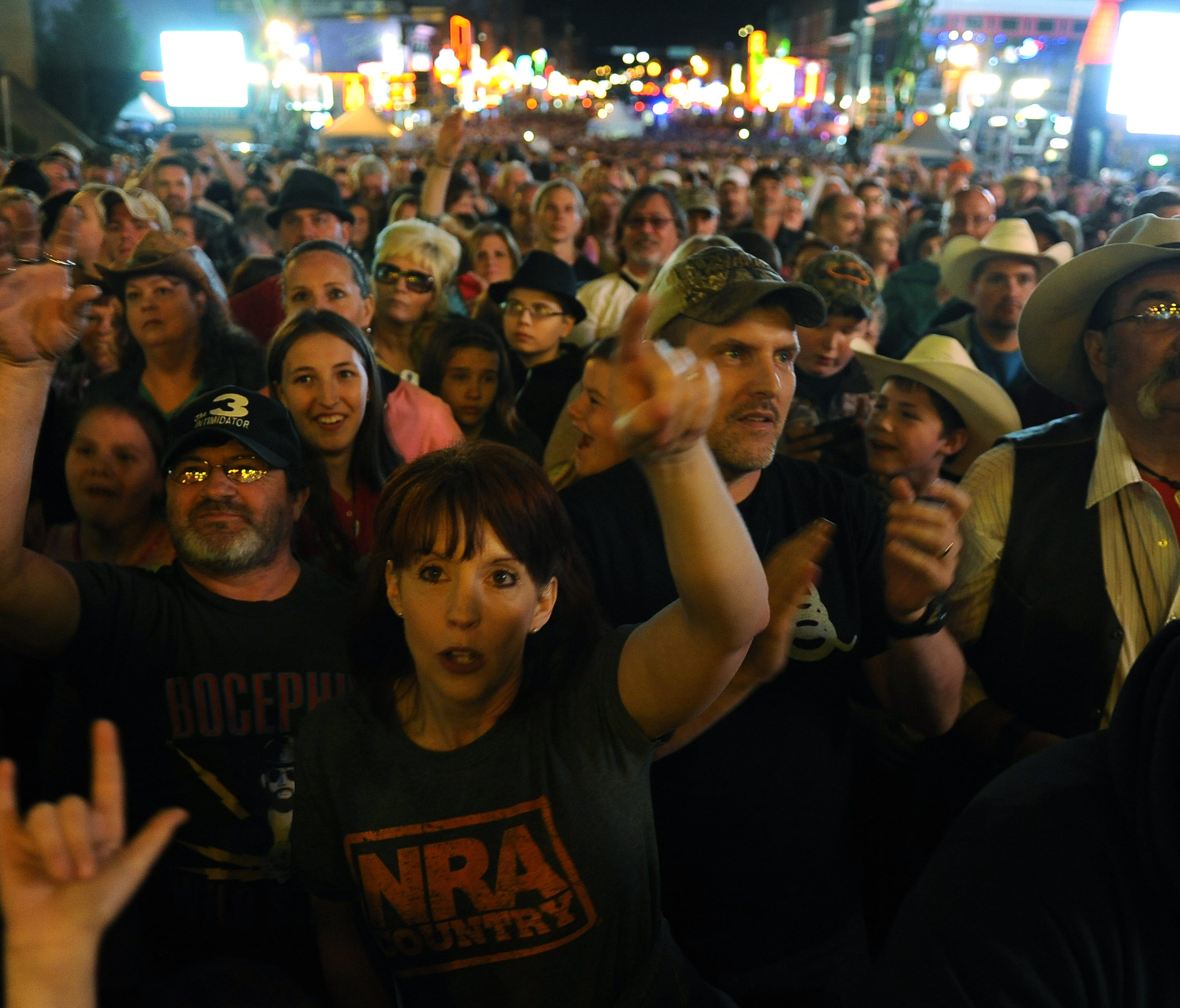 Fans watch Colt Ford's performance at the NRA Country Jam on April 10, 2015, in Nashville, Tenn.