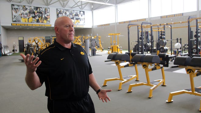 Iowa strength and conditioning coach Chris Doyle gives a tour of the weight room inside Iowa's Football Performance Center on Tuesday, Aug. 25, 2015.