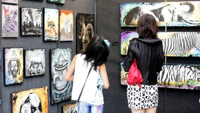 Visitors can explore the work of more than 1,000 artists -- from Michigan and around the globe --  at the Ann Arbor Art Fair.