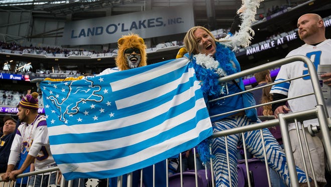 Oct 1, 2017; Minneapolis, MN, USA; Detroit Lions fans celebrate in the fourth quarter of the team's 14-7 win over the Minnesota Vikings at U.S. Bank Stadium.