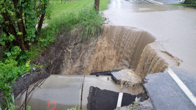 A portion of West Lake Road in Richmond collapsed due to flooding.