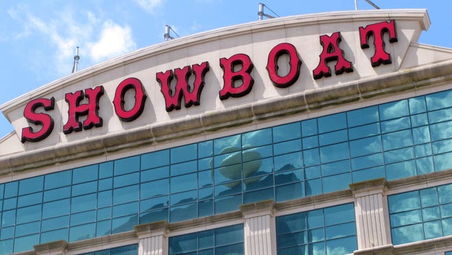 The decorative white ball atop the former Revel casino in Atlantic City is reflected in the glass facade of the next-door Showboat casino. Both facilities, which closed in 2014, are re-opening soon, but are taking very different paths. Revel will reopen as a casino, while Showboat will be a non-gambling hotel.
