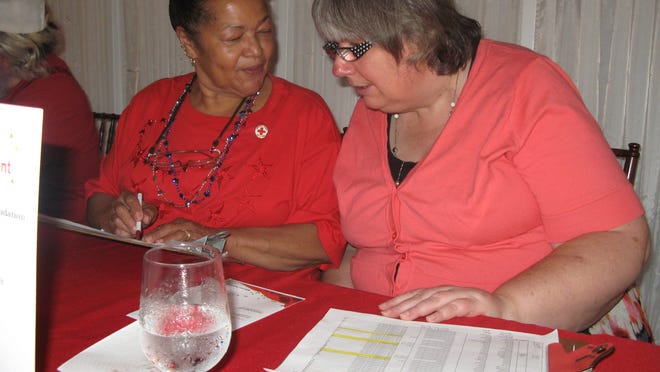 
Red Cross volunteer Diane Mueller, right, works with Deborah Williams at the registration desk for the 2014 Red Cross of the Mid-Hudson Valley Annual Meeting on June 3, 2014 at the Grandview in Poughkeepsie.
