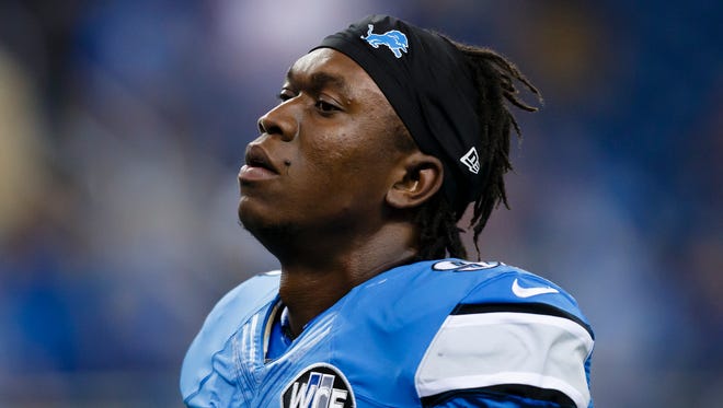 Detroit Lions defensive end Ziggy Ansah warms ups for a game against the New York Giants on Sept. 8, 2014.