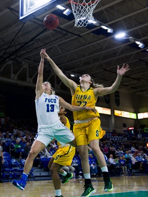Florida Gulf Coast University senior, Jordin Alexander, shoots a layup during the game against Siena College on Friday, December 9, 2016 at Alico Arena in Estero, Fla. 