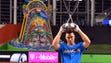 Aaron Judge hoists the trophy after winning the Home