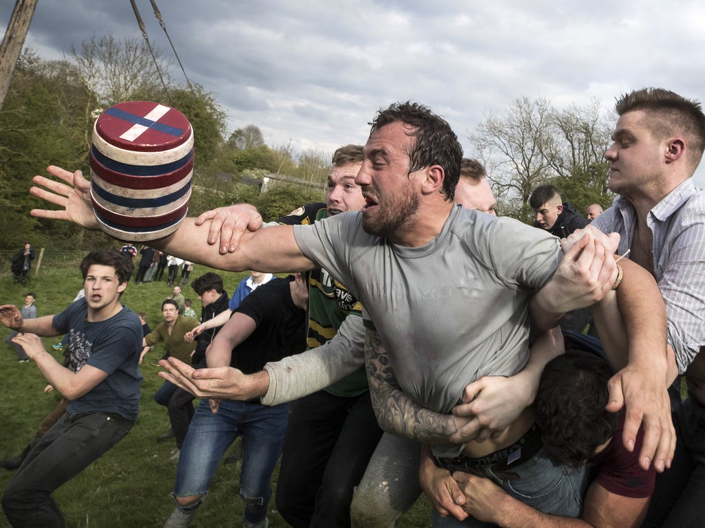 The second round of the bottle kicking gets underway over the Hare Pie Hill on  in Hallaton, England. The Bottle kicking competition sees two rival villages, Hallaton, and neighboring Medbourne attempt to carry a bottle which is actually a keg of bee