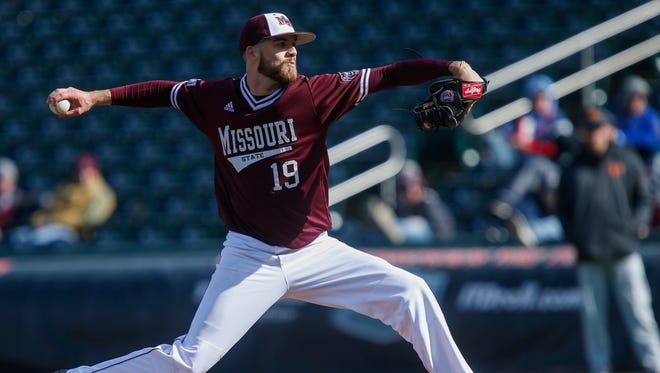 Tyler McAlister, of Missouri State, delivers the pitch as the Bears took on Oklahoma State in their 2018 home opener at Hammons Field on Wednesday, March 7, 2018.