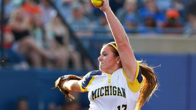 Michigan starter Haylie Wagner pitches against Florida during the fourth inning of Game 2 of the finals in the NCAA softball Women's College World Series, Tuesday, June 2, 2015, in Oklahoma City.