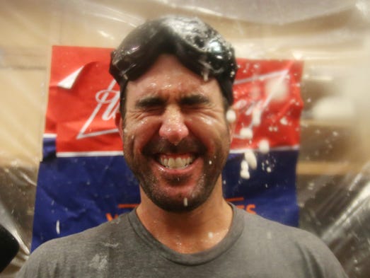 Justin Verlander celebrates in the clubhouse.
