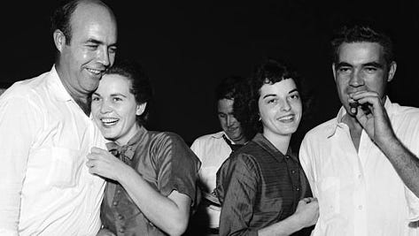 J.W. and Juanita Milam and Carolyn and Roy Bryant celebrate after the men's acquittals in the 1955 murder of Emmett Till. Months later, they confessed their guilt to Look magazine.