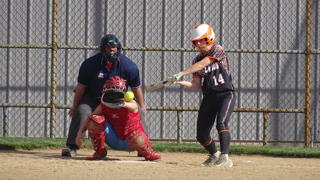 Ridgewood's Rachel Simpson zones in and swings at a pitch during Thursday's loss against Garaway.