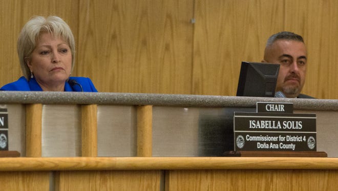 Isabella Solis, left is the new chair for the County Commission with John Vasquez, right, as vice chair, Tuesday, January 10, 2017 at the first Doña Ana County Commissioners meeting of the new year.