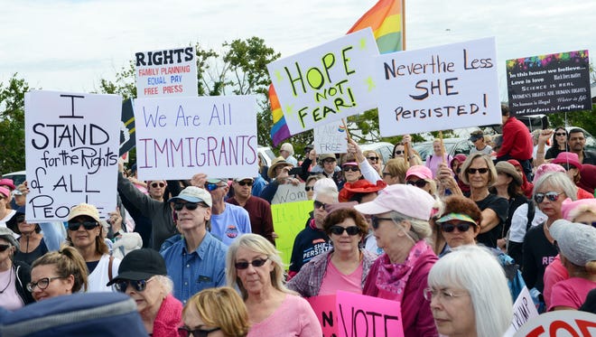 Thousands rally along the Eau Gallie Causeway during the 2018 Brevard Women's March.
