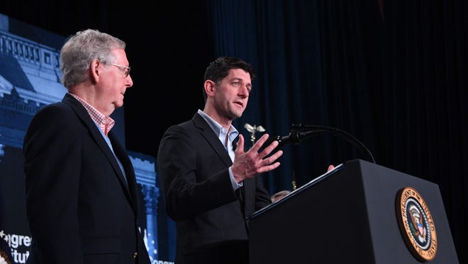 House Speaker Paul Ryan (R) and Senate majority leader Mitch McConnell (L) deliver a speech in White Sulphur Springs, West Viriginia during the Republican party retreat on February 01, 2018.