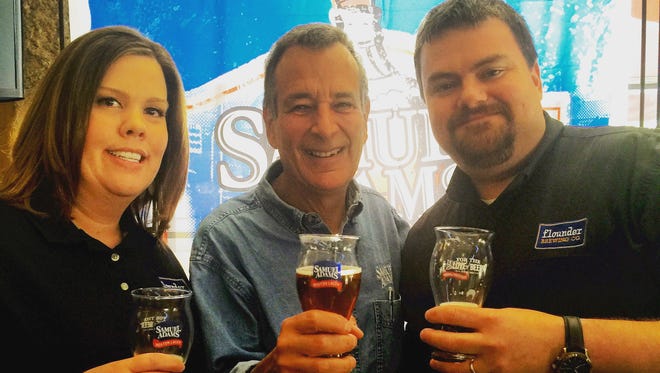 Samuel Adams recently selected Hillsborough-based craft brewery Flounder Brewing Co. has been selected as the winner of the 2016 Brewing and Business Experienceship. Pictured from left to right are 
Melissa Lees from Flounder Brewing Co.
Jim Koch from Boston Beer/Sam Adams, and
Jeremy "Flounder" Lees.