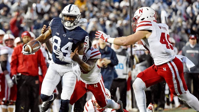 Penn State's Juwan Johnson carries the ball against Nebraska in the first half of an NCAA Division I football game Saturday, Nov. 18, 2017, at Beaver Stadium. Penn State defeated Nebraska 56-44 in its final home game of the 2017 season.