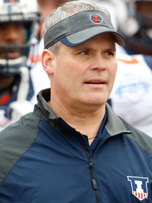 Illinois Fighting Illini head coach Tim Beckman waits to go on the field with his team before the game against the Louisiana Tech Bulldogs in the Heart of Dallas Bowl at Cotton Bowl Stadium.