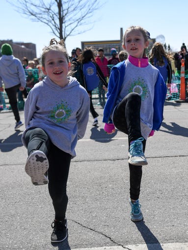 Sienna Heath (right), from Urbandale, dances an Irish