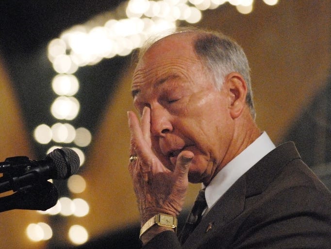 Green Bay Packers legend Bart Starr wipes away tears while delivering an emotional keynote speech during the National Day of Prayer breakfast at the Riverside Ballroom in Green Bay on May 2, 2008.
