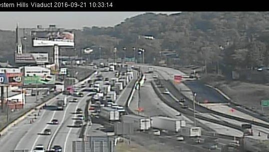 Traffic on I-75 is backing up due to a lane restriction at Hopple Street for emergency drain repairs