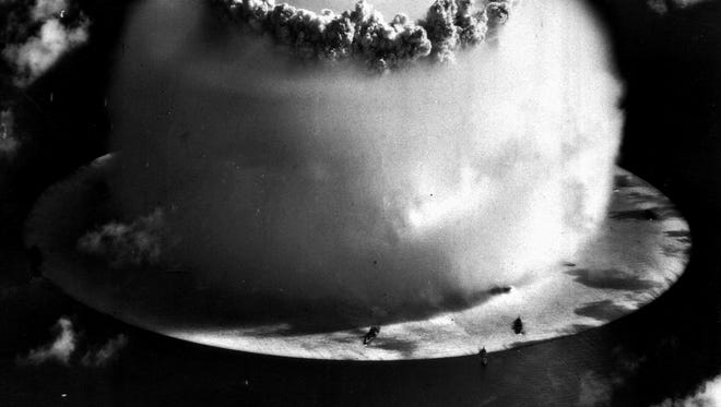 A huge mushroom cloud rises above Bikini atoll in the Marshall Islands July 25, 1946, following an atomic test blast, part of the U.S. military's "Operation Crossroads."