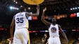 Kevin Durant and Draymond Green celebrate during the