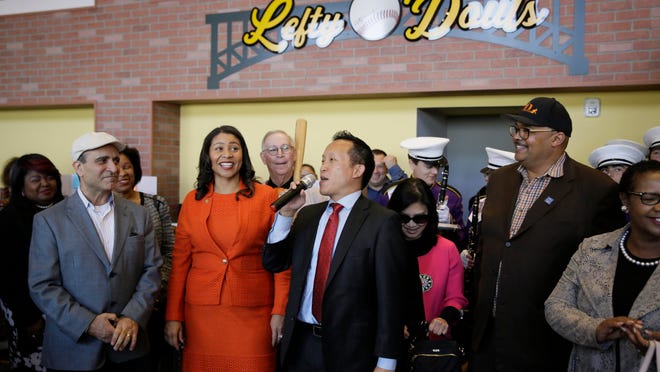 From left, owner Nick Bovis, San Francisco Mayor London Breed, state assemblyman David Chiu, speaking, and city public works director Mohammed Nuru take part in the opening ceremonies of Lefty O’Doul’s Baseball Ballpark Buffet & Cafe at Fisherman’s Wharf in San Francisco in 2018.