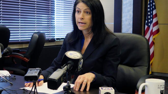 Michigan Attorney General Dana Nessel addresses the media during a news conference in Lansing, Mich.