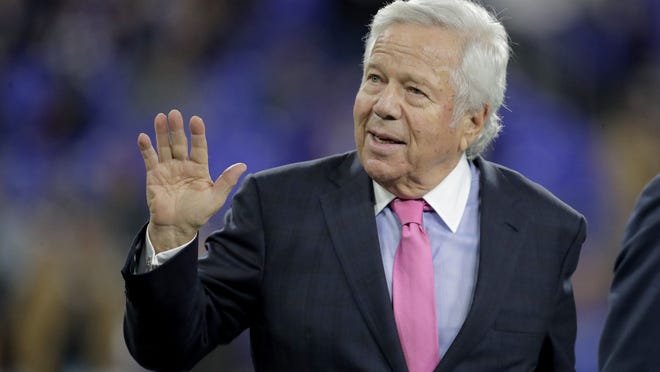 In this Nov. 3, 2019, file photo, New England Patriots owner Robert Kraft waves to fans as he walks on the field prior to the team's NFL football game against the Baltimore Ravens in Baltimore. Florida prosecutors will try to save their prostitution solicitation case against Kraft when they argue before an appellate court Tuesday, June 30, 2020, that his rights weren't violated when police secretly video recorded him allegedly paying for sex at a massage parlor.