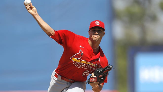 St. Louis Cardinals pitcher Jack Flaherty warms up during the first inning of a spring training baseball game against the New York Mets, Wednesday, March 4, 2020, in Port St. Lucie, Fla.