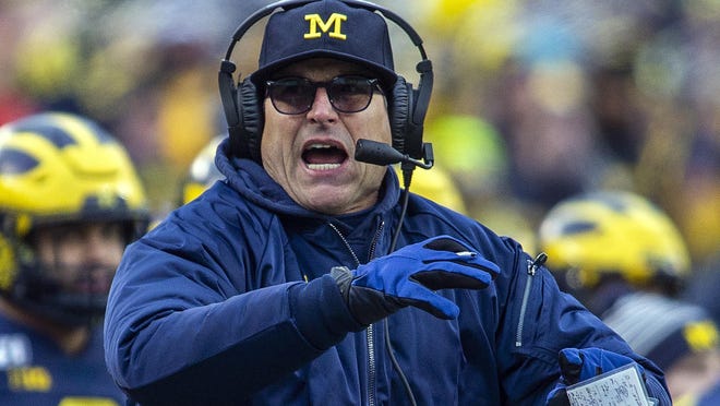 Michigan head coach Jim Harbaugh won't have a game to coach this weekend after the Wolverines paused all in-person football activities until Monday. That action canceled the game Saturday with Maryland and threatens the game next weekend against Ohio State.