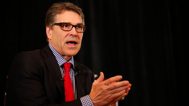 Former Texas governor Rick Perry speaks to the Dallas County GOP at the West Des Moines Marriott Thursday, March 19, 2015.