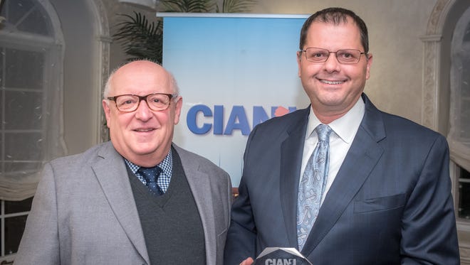 Andrew Silverstein, chairman of the CIANJ Board, presents CIANJ’s “Champion of Good Works” Award to Michael Mimoso, MHSA, FACHE, President and Chief Executive Officer, Community Medical Center.
