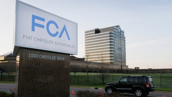The Fiat Chrysler Automobiles sign is seen at Chrysler World Headquarters in Auburn Hills, Mich.