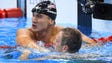 Nathan Adrian (USA) greets Kyle Chalmers (AUS) after