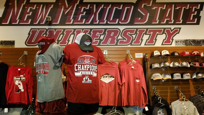 The New Mexico State University 2017 Championship shirts on display at the Sports Accessories. Wednesday January 3, 2017.