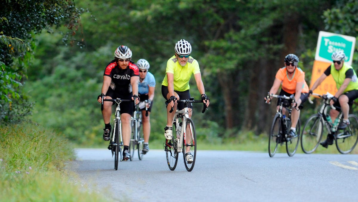 Members of the Mid-Hudson Bicycle Club lead the pack around a corner in the Town of LaGrange.
